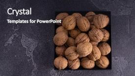  Presentation with cracked - Amazing presentation theme having whole and cracked walnuts backdrop and a dark gray colored foreground