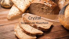  Presentation with bread - Presentation theme with whole grains - freshly baked bread assortment background and a coral colored foreground