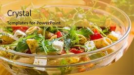  Presentation with pasta sauce - Theme consisting of whole wheat pasta salad with fresh arugula mozzarella roasted red bell peppers and pesto sauce background and a yellow colored foreground