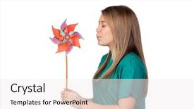  Presentation with pinwheel - Beautiful PPT theme featuring wind fan - funny girl blowing a pinwheel backdrop and a  colored foreground