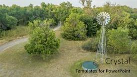  Presentation with water tank - PPT theme consisting of windmill-with-a-water-tank and a coral colored foreground