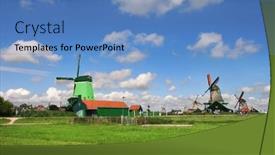  Presentation with windmills - Amazing PPT layouts having windmills along green fields under beautiful blue sky with white clouds in zaanse schans - famous village in netherlands backdrop and a teal colored foreground