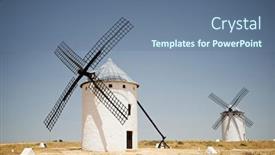  Presentation with windmills - Audience pleasing PPT theme consisting of windmills-in-campo-de-criptana backdrop and a ocean colored foreground