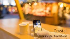  Presentation with chocolate wine - Slide set with winter holidays technology and people concept - hand with mulled wine or hot chocolate drinks picture on smartphone at christmas market background and a gold colored foreground