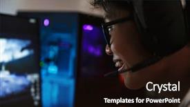  Presentation with computer room - Audience pleasing slides consisting of photo closeup of asian pleased gamer boy playing video games online on computer in dark room wearing headphones with microphone and using backlit colorful keyboard backdrop and a wine colored foreground