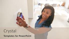  Presentation with heating ventilation - Audience pleasing PPT theme consisting of woman-adjusting-digital-central-heating backdrop and a mint green colored foreground