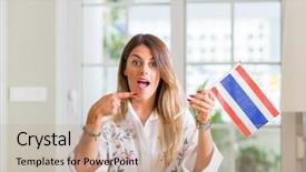  Presentation with flag and cross - Audience pleasing PPT theme consisting of woman at home holding flag backdrop and a  colored foreground