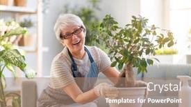  Presentation with caring - Amazing PPT theme having woman-caring-for-plants backdrop and a coral colored foreground