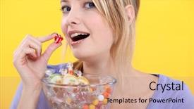  Presentation with candy - Audience pleasing PPT theme consisting of woman eating candy backdrop and a coral colored foreground