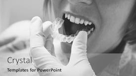  Presentation with mold - PPT theme having woman-getting-dental-mold-made background and a light gray colored foreground