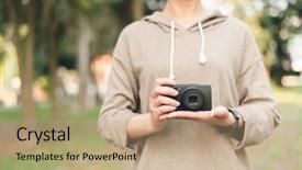  Presentation with cctv digital forensic science - Amazing PPT theme having woman hold a digital camera backdrop and a coral colored foreground