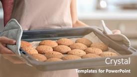  Presentation with baking cookies - Audience pleasing presentation theme consisting of woman holding baking tray with delicious oatmeal cookies in kitchen closeup backdrop and a coral colored foreground
