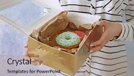  Presentation with box carton - Audience pleasing presentation theme consisting of woman holding carton box with tasty donuts close up view backdrop and a coral colored foreground