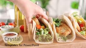  Presentation with taco - Colorful slide deck enhanced with woman holding delicious fish taco in kitchen backdrop and a coral colored foreground