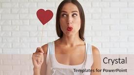  Presentation with red brick wall - Presentation theme consisting of woman holding red paper heart background and a coral colored foreground