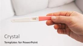  Presentation with pregnancy - PPT layouts having woman-holds-the-pregnancy-test background and a white colored foreground