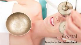  Presentation with singing bowl - Audience pleasing presentation consisting of woman in spa setting having a singing bowl massage therapy backdrop and a coral colored foreground