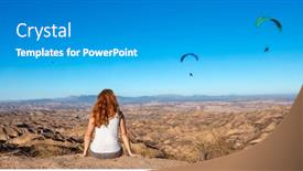  Presentation with desert - Presentation theme with woman-looking-at-paraglider background and a gray colored foreground