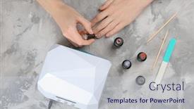  Presentation with manicure - Beautiful PPT theme featuring woman making manicure near ultraviolet lamp on table backdrop and a sky blue colored foreground