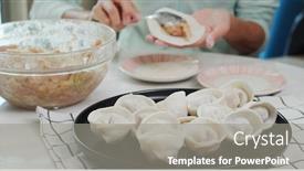  Presentation with dumpling - PPT theme enhanced with woman-making-meat-dumpling background and a gray colored foreground
