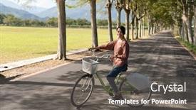  Presentation with bike - Audience pleasing PPT theme consisting of woman-ride-a-bike backdrop and a gray colored foreground