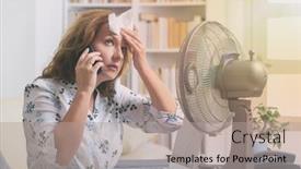  Presentation with heat - Presentation theme having woman suffers from heat while working in the office and tries to cool off by the fan background and a light gray colored foreground