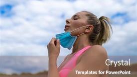  Presentation with sports field - Amazing PPT theme having woman-takes-off-facemask backdrop and a coral colored foreground