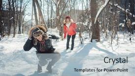  Presentation with teasing - Audience pleasing presentation theme consisting of woman throwing snowball on her backdrop and a light blue colored foreground