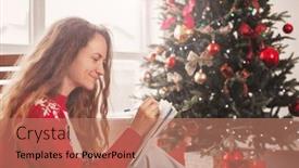  Presentation with writing-notes - Presentation theme with woman-writing-christmas-wishes and a coral colored foreground