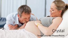  Presentation with wife - Presentation theme having fetus pregnant women - man kissing his wife's belly background and a lemonade colored foreground