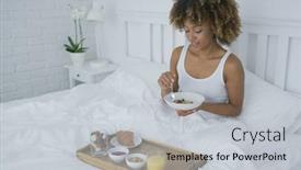  Presentation with granola - Cool new slide deck with wonderful young model with curly hair relaxing on bed in morning time having healthy breakfast on tray and eating granola backdrop and a light gray colored foreground