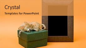  Presentation with ribbon green - Audience pleasing slide set consisting of wood photo frame and green gift box with golden ribbon on orange background backdrop and a yellow colored foreground