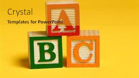  Presentation with abc - Theme enhanced with wooden-abc-blocks-on-yellow background and a gold colored foreground