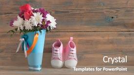  Presentation with baby shoes - PPT theme enhanced with wooden background baby waiting background and a coral colored foreground