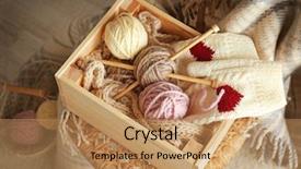  Presentation with needles - Beautiful theme featuring wooden box with knitting yarn and needles on chair closeup backdrop and a coral colored foreground
