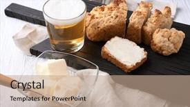  Presentation with butter - Beautiful presentation theme featuring wooden cutting board with sliced loaf of beer bread and butter backdrop and a coral colored foreground