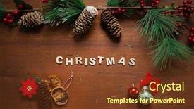  Presentation with pine trees - Amazing PPT theme having wooden-pieces-made-christmas-word backdrop and a tawny brown colored foreground