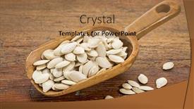  Presentation with pumpkin seeds - Presentation design having wooden rustic scoop of fresh pumpkin seeds against grunge weathered wood background and a coral colored foreground