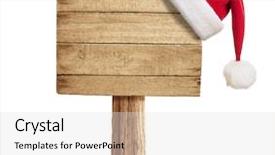  Presentation with christmas blank wooden signboard - Amazing PPT theme having wooden signboard with christmas hat backdrop and a light gray colored foreground