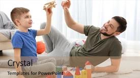  Presentation with father - Slide set with wooden toy - father playing with his son background and a coral colored foreground