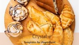  Presentation with bakery - Cool new slide set with wooden-tray-with-different-bakery backdrop and a gold colored foreground