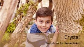  Presentation with game - PPT theme enhanced with woodland games - portrait of boy playing game background and a  colored foreground