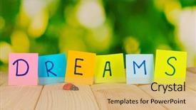  Presentation with dreams - Audience pleasing slide deck consisting of word dreams on wooden table on natural background backdrop and a yellow colored foreground