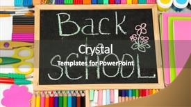  Presentation with school desk - Colorful PPT theme enhanced with words 'back to school' written in chalk on the small school desk with various school supplies close-up backdrop and a dark gray colored foreground