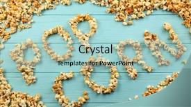 Presentation with maize - Presentation featuring words pop corn made of maize grains on wooden background background and a light blue colored foreground