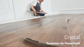  Presentation with vinyl - Amazing PPT theme having worker-laying-vinyl-floor-covering backdrop and a coral colored foreground