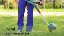  Presentation with outdoor worker safety - PPT layouts having worker mowing lawn with grass background and a yellow colored foreground