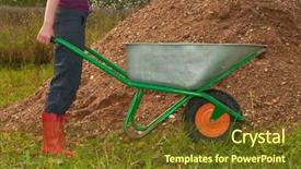  Presentation with hill - Audience pleasing PPT theme consisting of worker with a wheelbarrow near backdrop and a tawny brown colored foreground