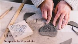  Presentation with ceramic ware - PPT theme consisting of working-with-clay-in-pottery background and a soft green colored foreground