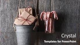 Presentation with christmas candy - Cool new PPT theme with wrapped christmas presents and candy canes hanging against a rustic wood wall backdrop and a dark gray colored foreground